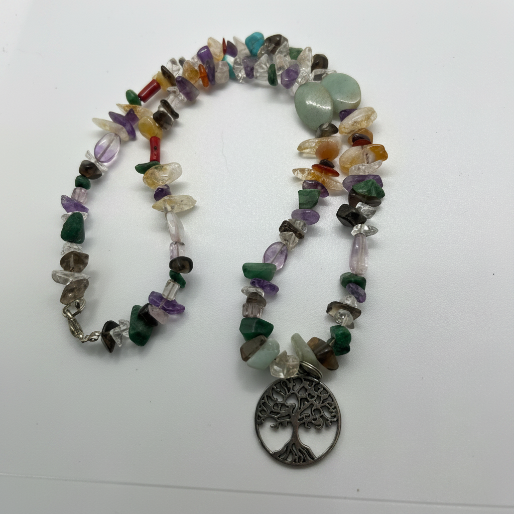 Tree of life multi-gemstone chip necklace full layout cleaned up on white background with studio lighting